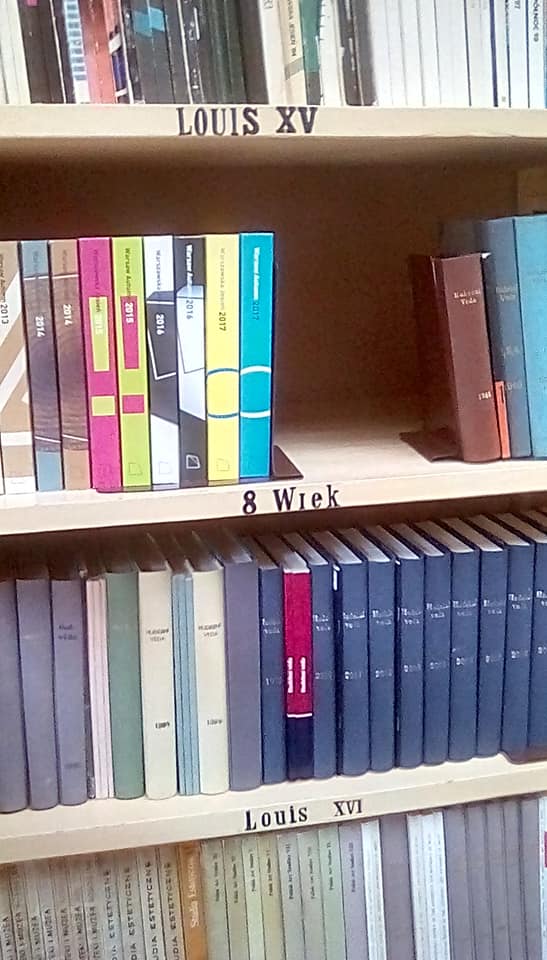 Photo of books on a library shelf