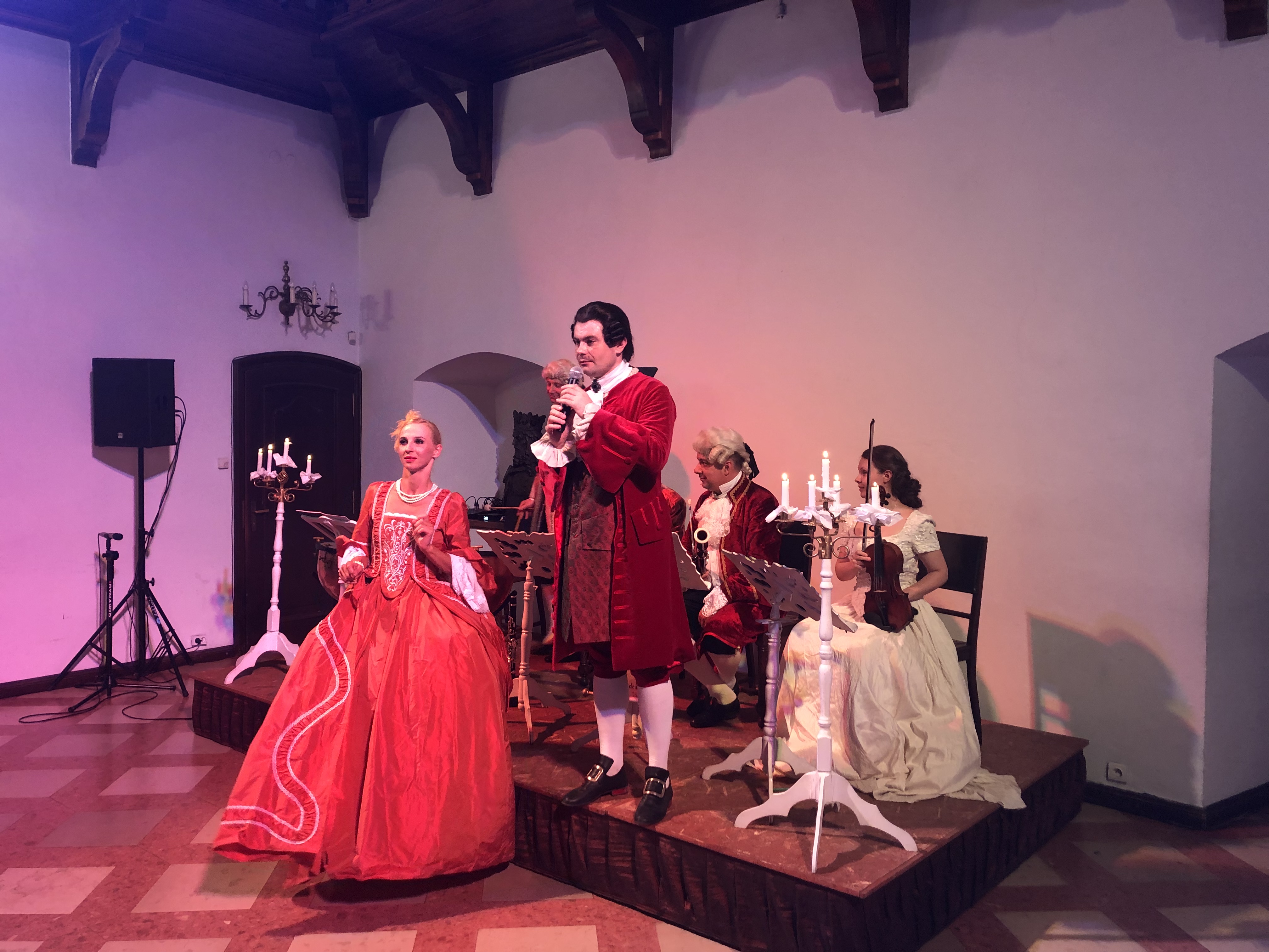 Singers performing in period costumes